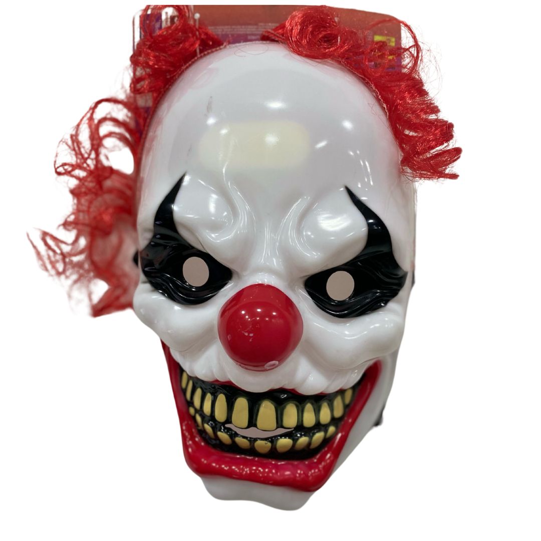 Mascara de payaso con pelo rojo